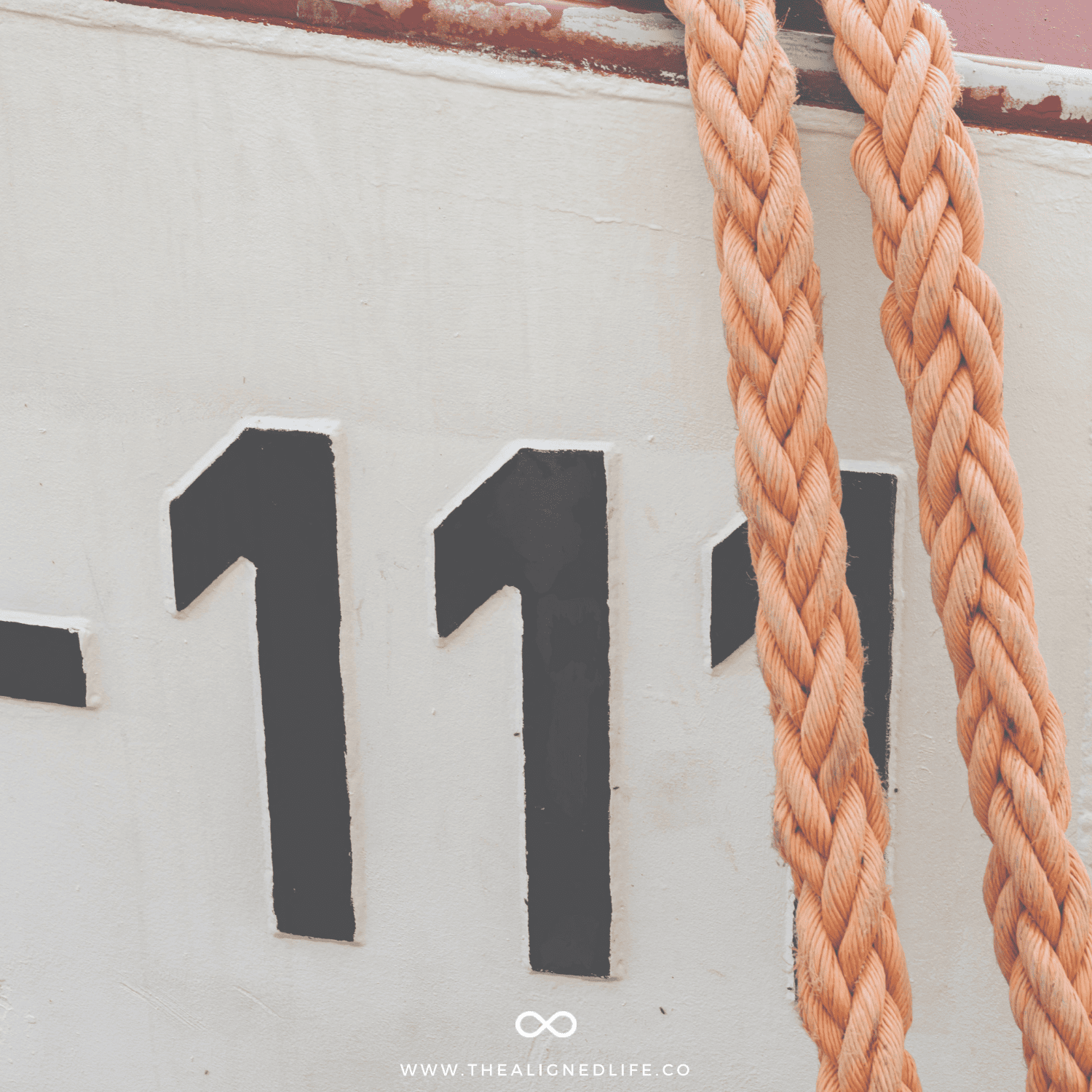 The Meaning of Angel Number 111 for Money, Love + More