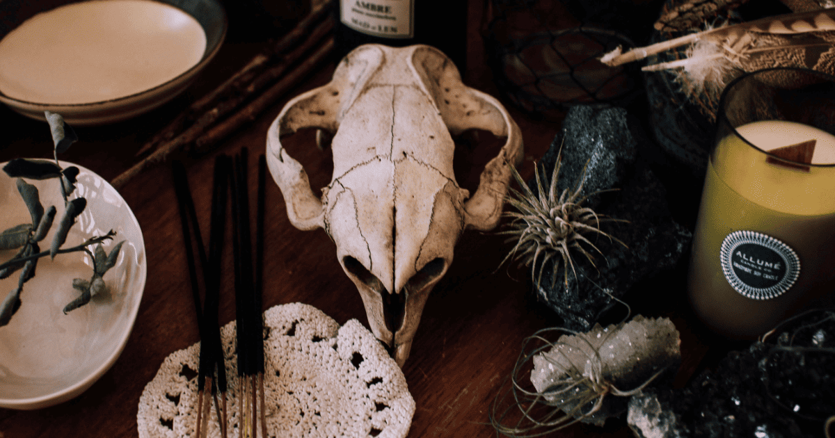 crystals and palo santo on an altar | How to Create An Altar: Creating Your Sacred Space | The Aligned Life Manifestation Blog