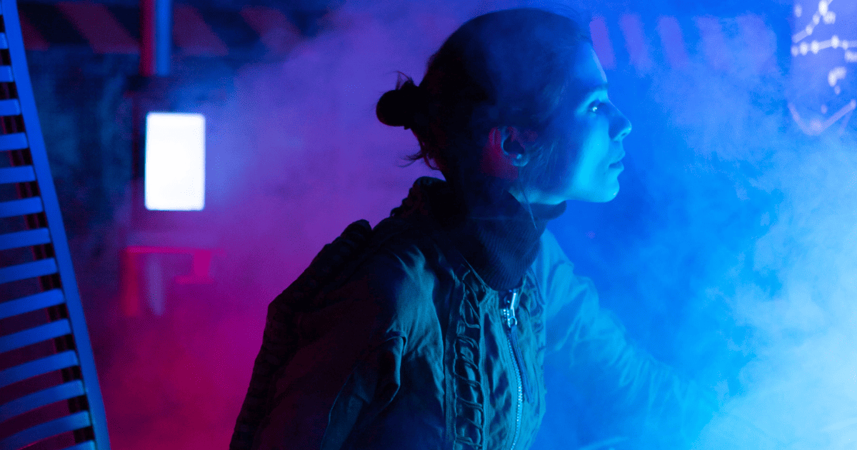 woman in purple and blue fog | Is Manifestation Real? 3 Ways It's Proven By Science | The Aligned Life Manifestation Blog