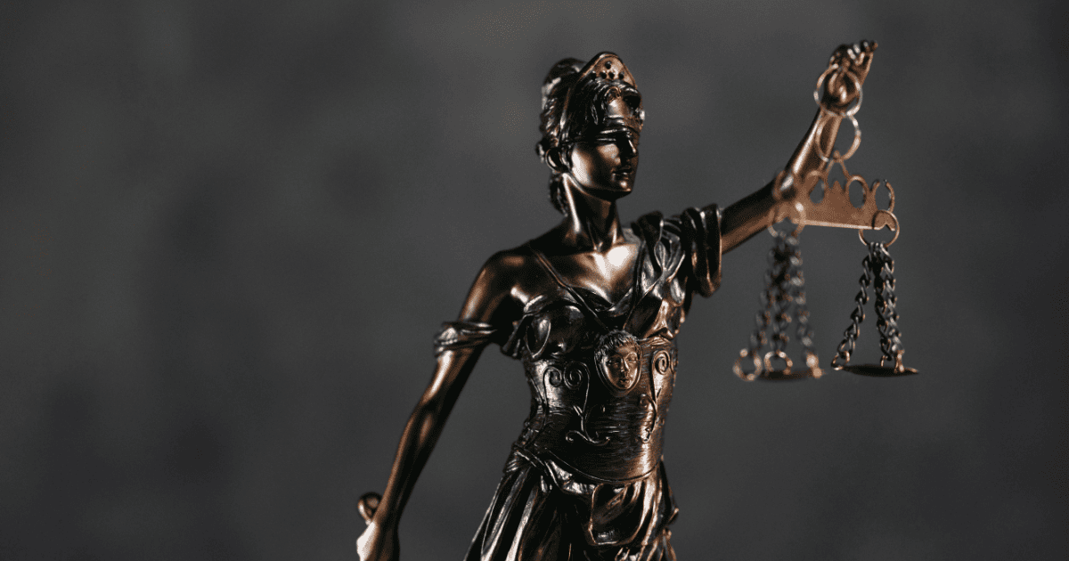 bronze statue of justice holding scales | Libra Season: Journal Prompts, Ritual Ideas & More