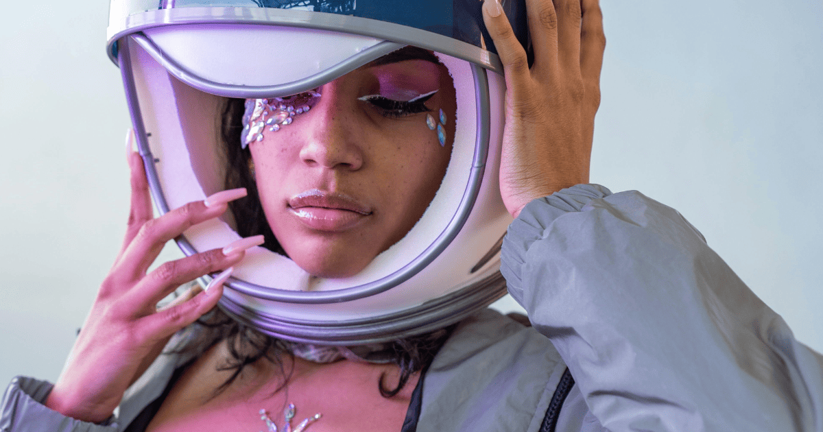 woman wearing an astronaut helmet | How To Reprogram Your Subconscious Mind