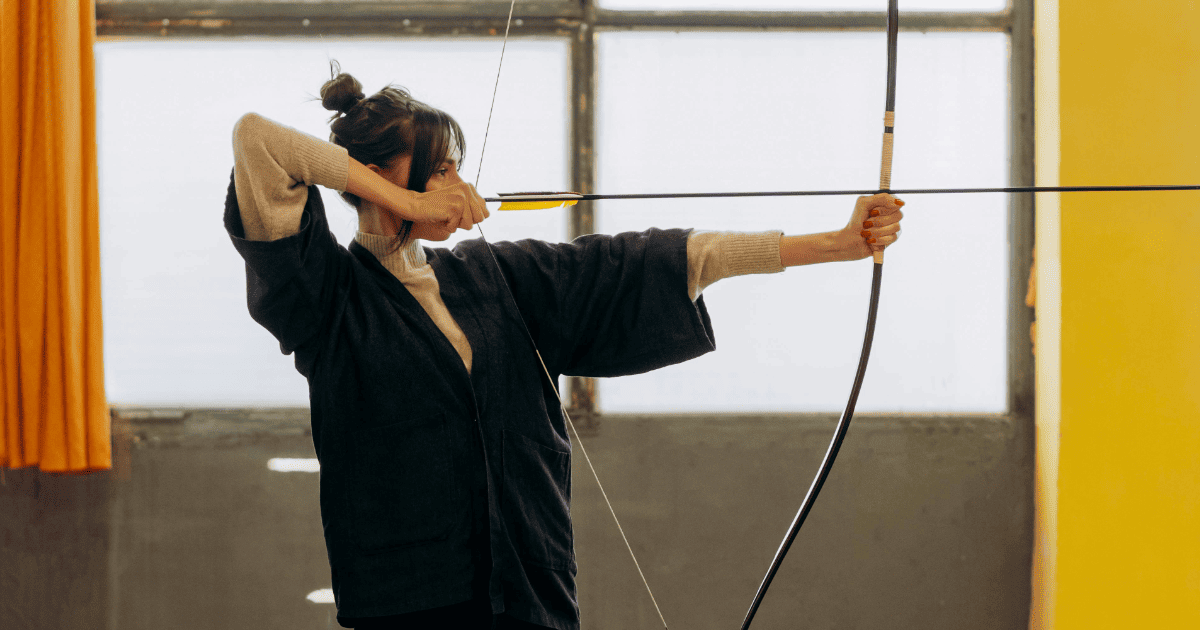 woman with a bow and arrow | Sagittarius Season Report: Rituals, Journal Prompts + More