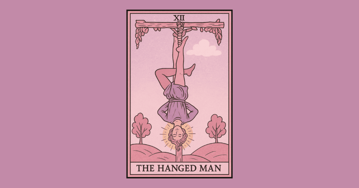 a man hanging from a tree by one foot with a halo around his head | The Hanged Man tarot card from the Rider Waite deck